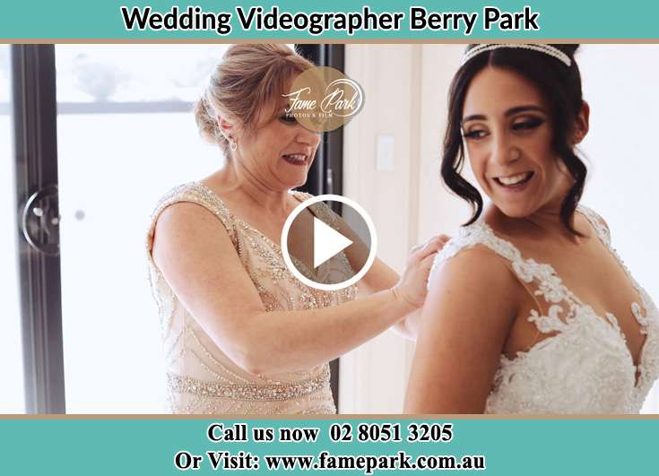 A woman helping the Bride to get ready for the wedding Berry Park NSW 2321