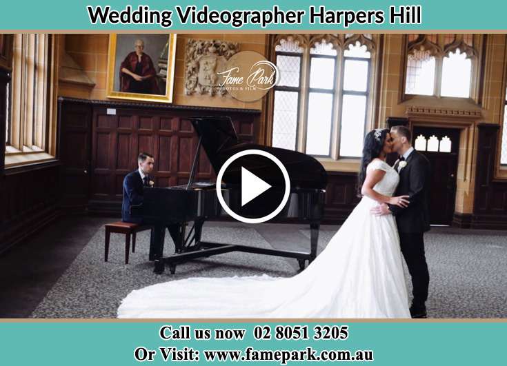 The newlyweds dancing while the pianist playing their song Harpers Hill NSW 2321