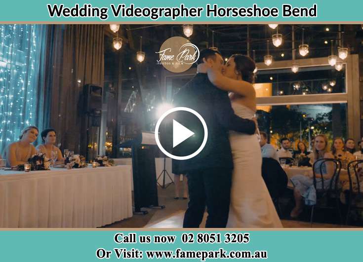 The new couple kissing on the dance floor Horseshoe Bend NSW 2320