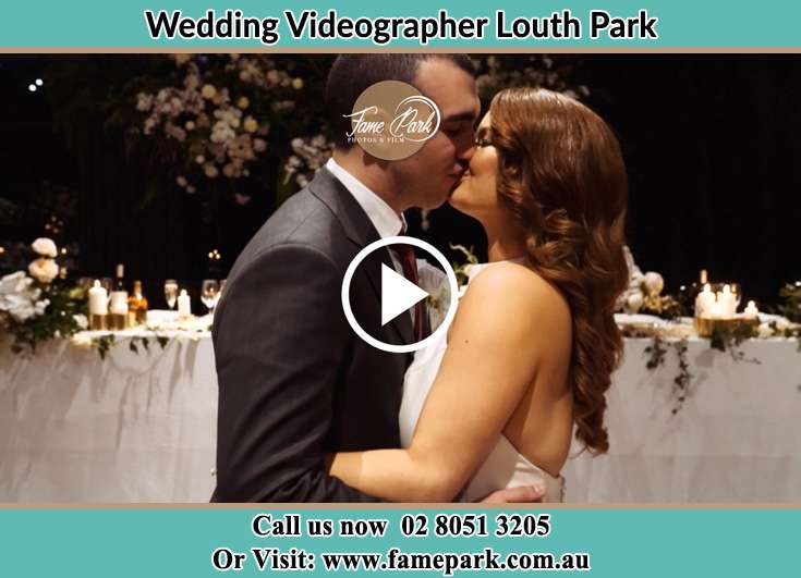 The newlyweds kissing Louth Park NSW 2320