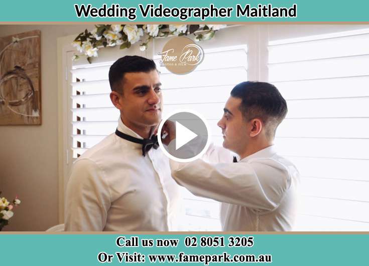 A groomsman fixing the Groom's tie Maitland NSW 2320