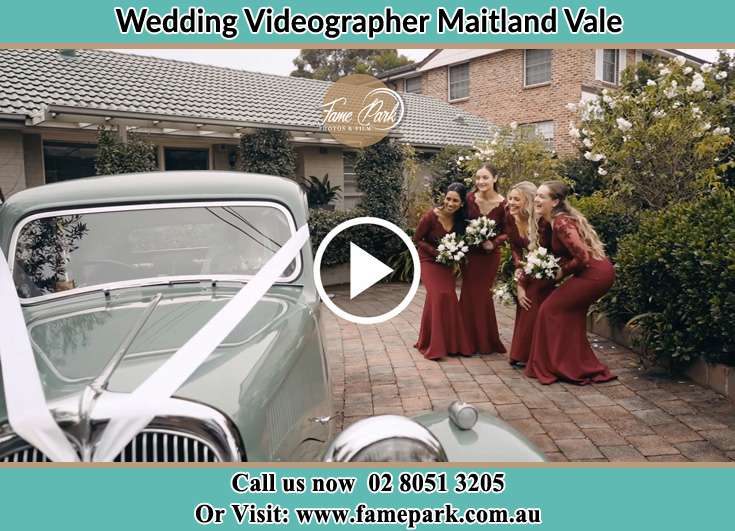 The girls looking at the wedding car Maitland Vale NSW 2320