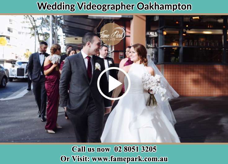 The Groom and the Bride walking in the streets Oakhampton NSW 2320